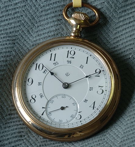 The T. Eaton Co. Limited' nickel cased lever pocket watch, signed 15 jewel  movement, no. 142853, Arabic numeral dial signed 'E', with inner 24-hour  numerals, minute track and subsidiary seconds, blued steel